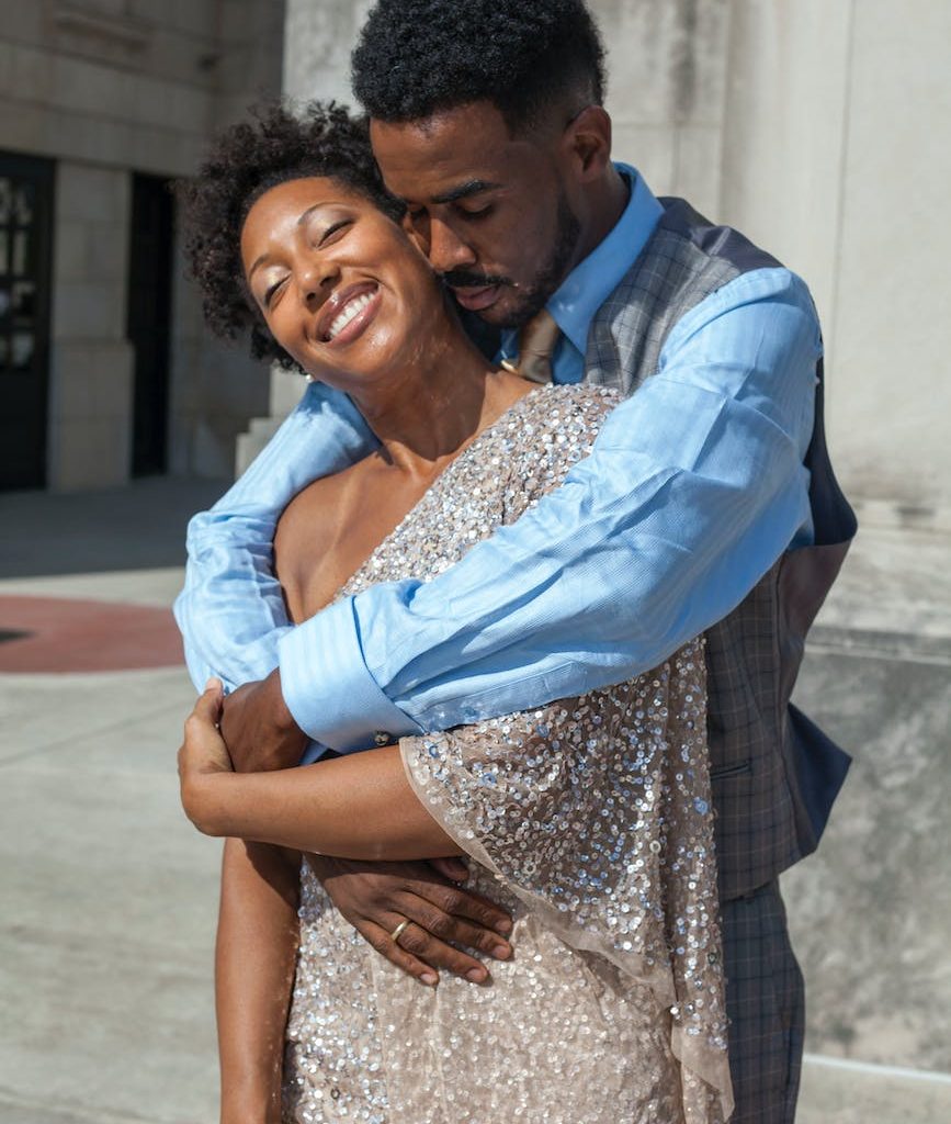man embracing her lovely wife