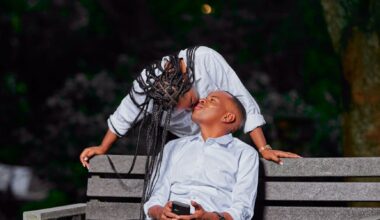romantic couple on park bench at dusk
