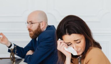 a couple in mediation hearing in a law office